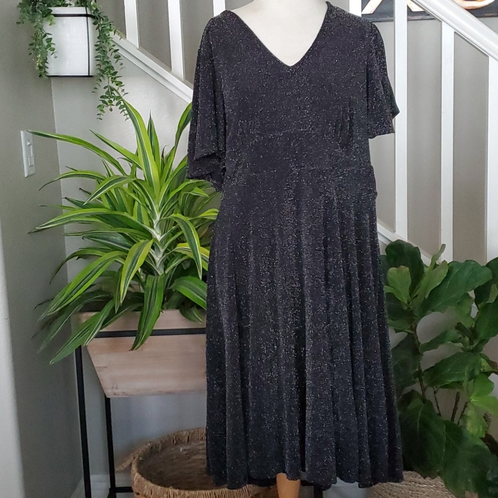 BLACK & SILVER FLUTTER SLEEVE GLITTER SKAT…